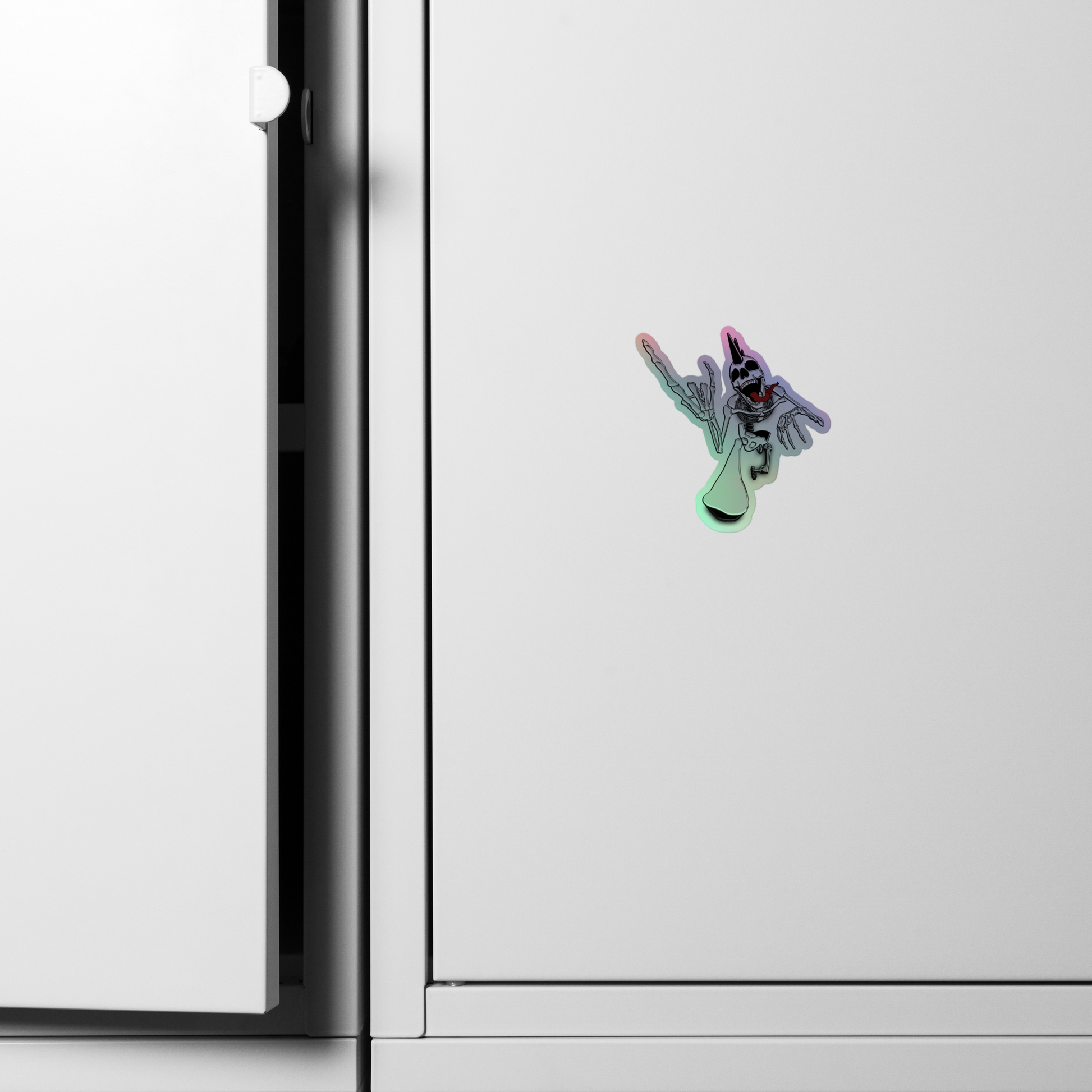 Colorful holographic punk rock skeleton holding up heavy metal jorns on a white refrigerator door