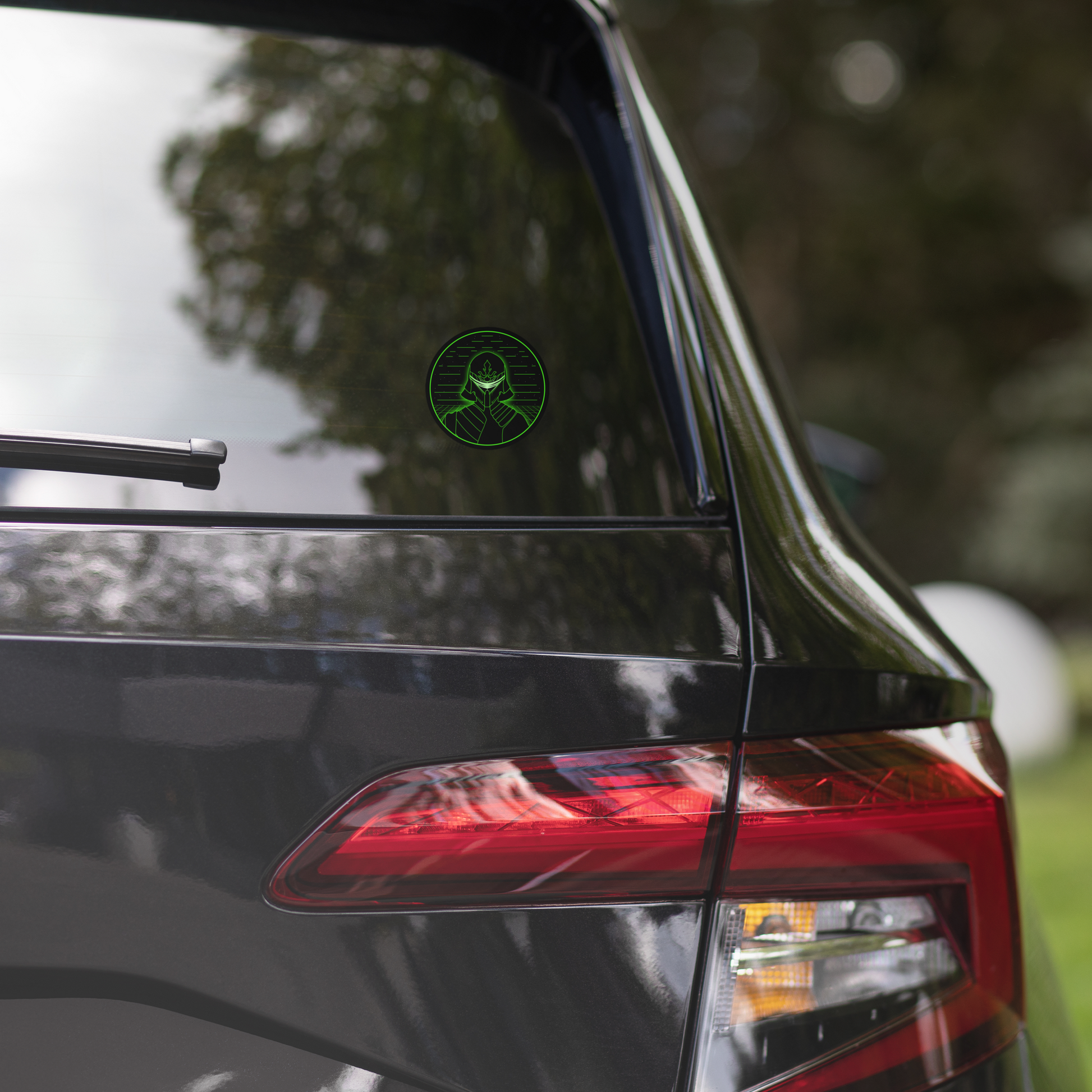 Car's rear with a green circular cyberpunk green decal on the window, blurred trees in the background