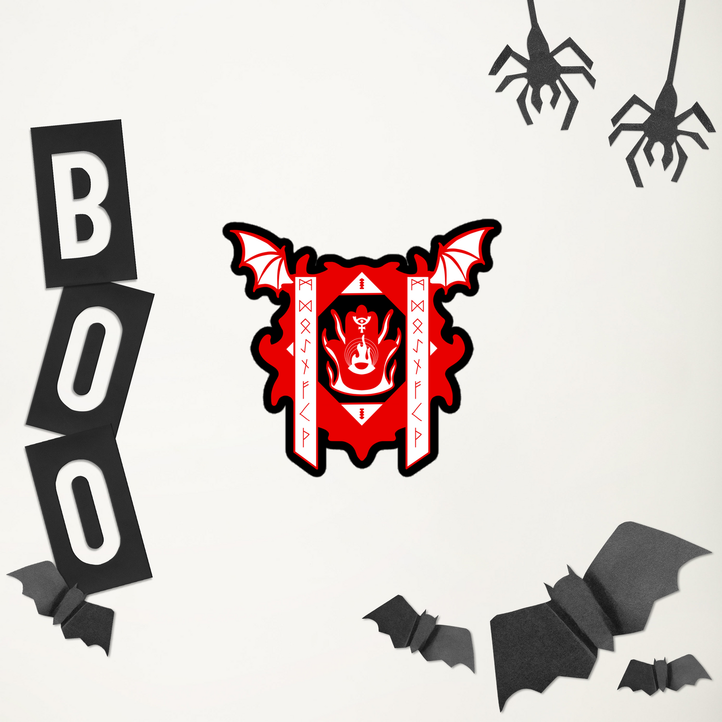 Halloween-themed decorations including a red and black emblem, 'BOO' letters, bats, and spiders on a white background.