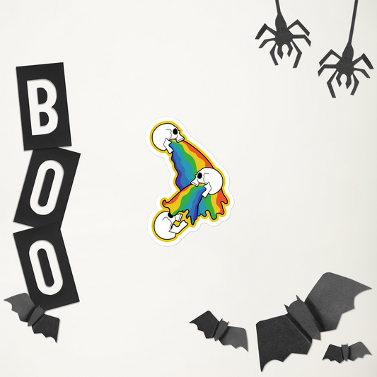 Sticker of Sticker with skeletons vomiting rainbows on each other on a white background in front of Halloween-themed decorations including a rainbow-colored ghost, 'BOO' letters, bats, and spiders on a white background.