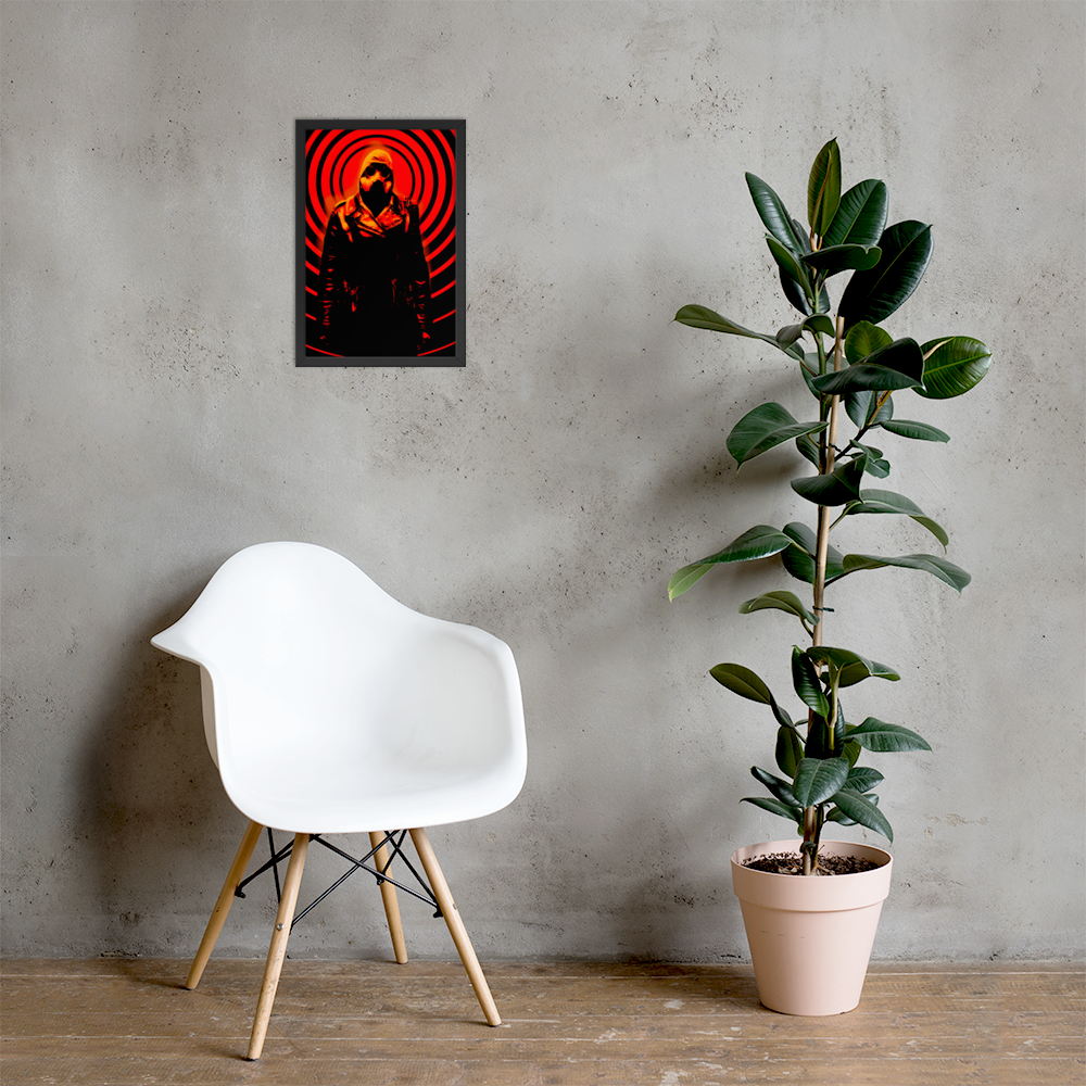 White chair and potted plant against a gray wall with a framed poster of a 12x18 mysterious figure in a dark outfit with a hood and a gas mask against an orange and black circular background.