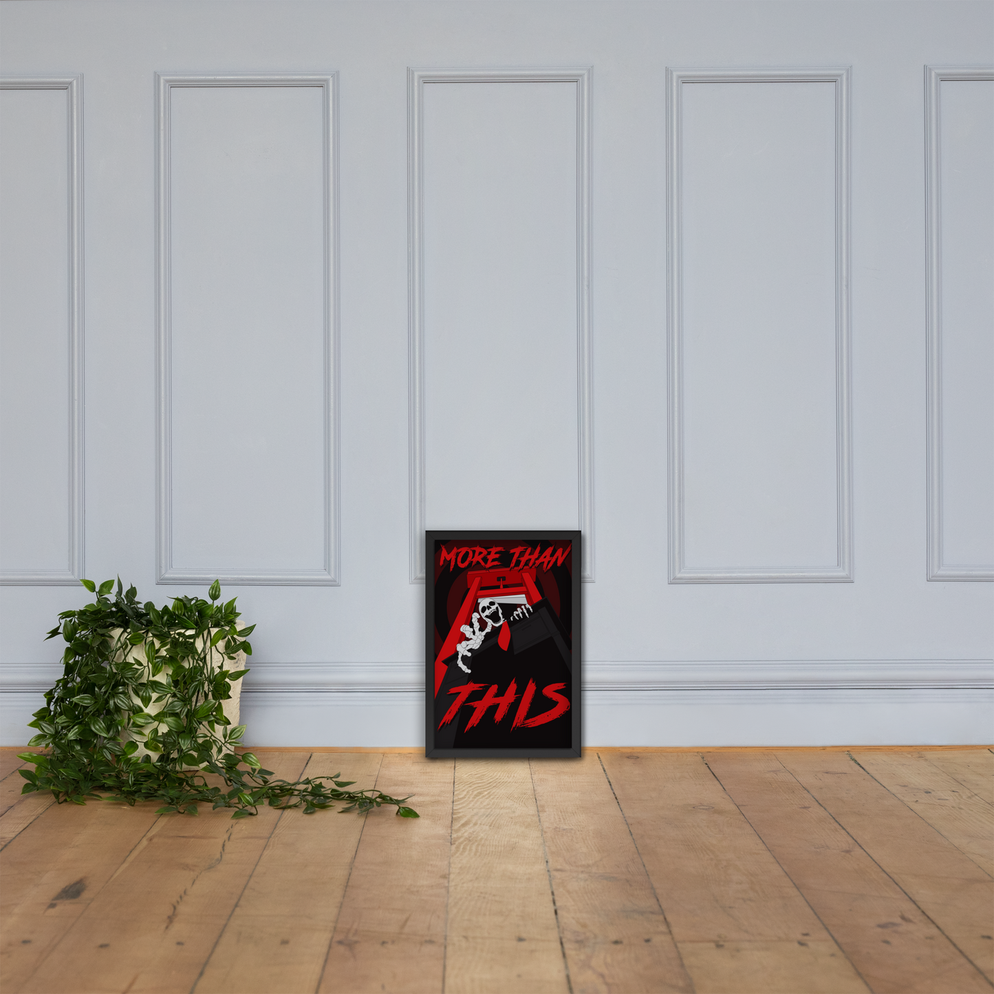 Framed poster with text and graphic leaning against a white paneled wall.