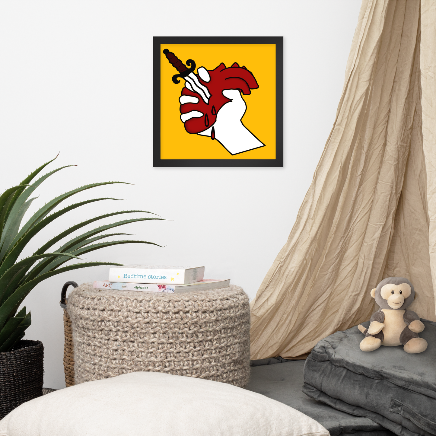 Room interior with a framed artwork on the wall, a plant, a woven basket, and a plush monkey toy.