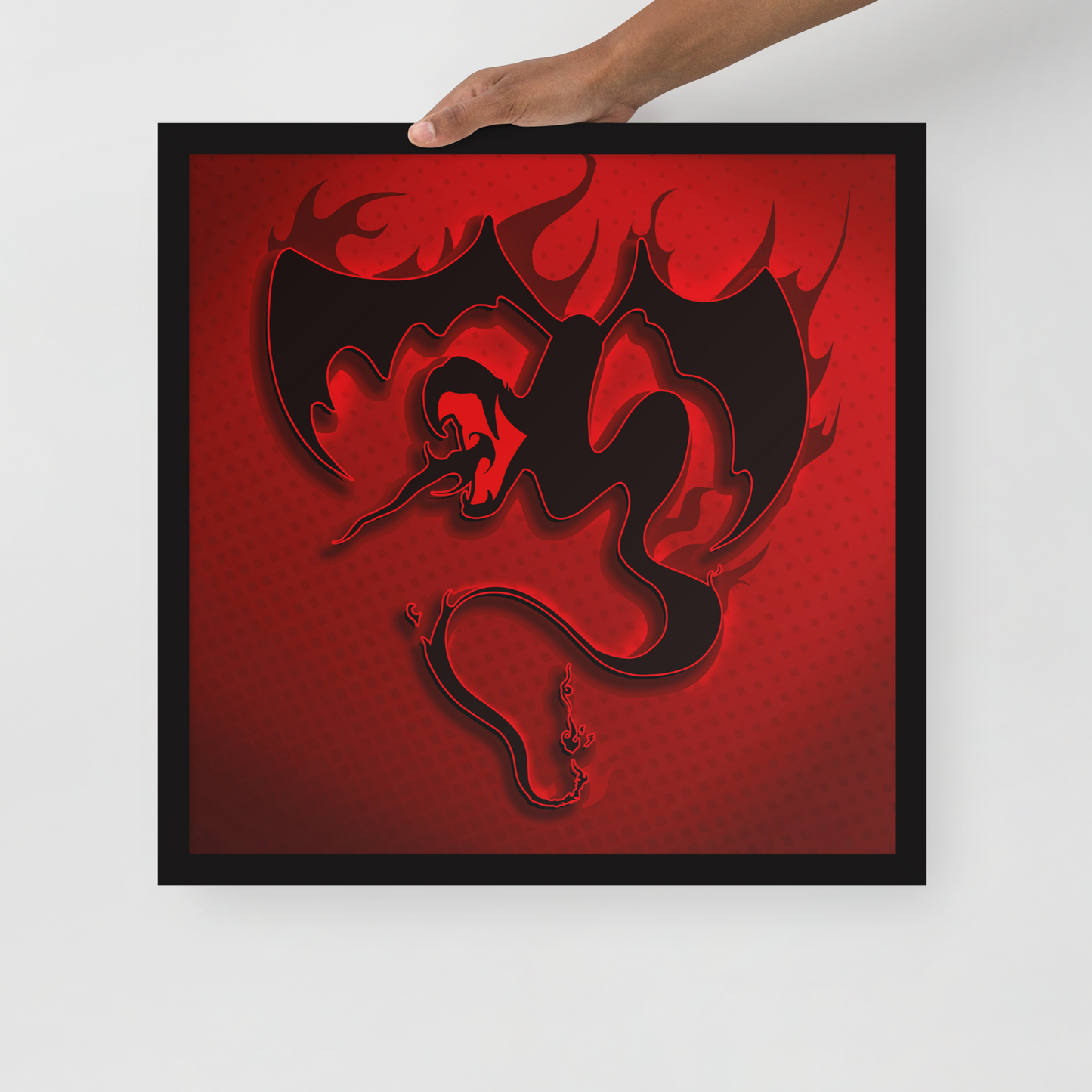 Framed artwork of a black snake dragon on a red background