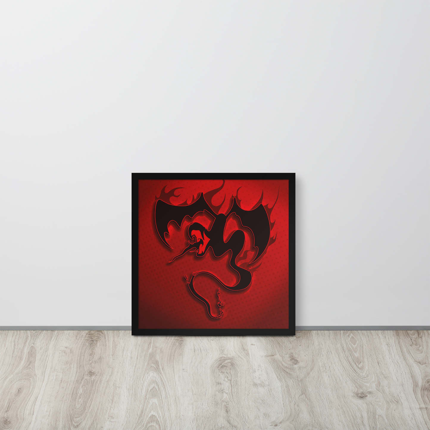 Framed artwork of a black dragon on a red background against a white wall.