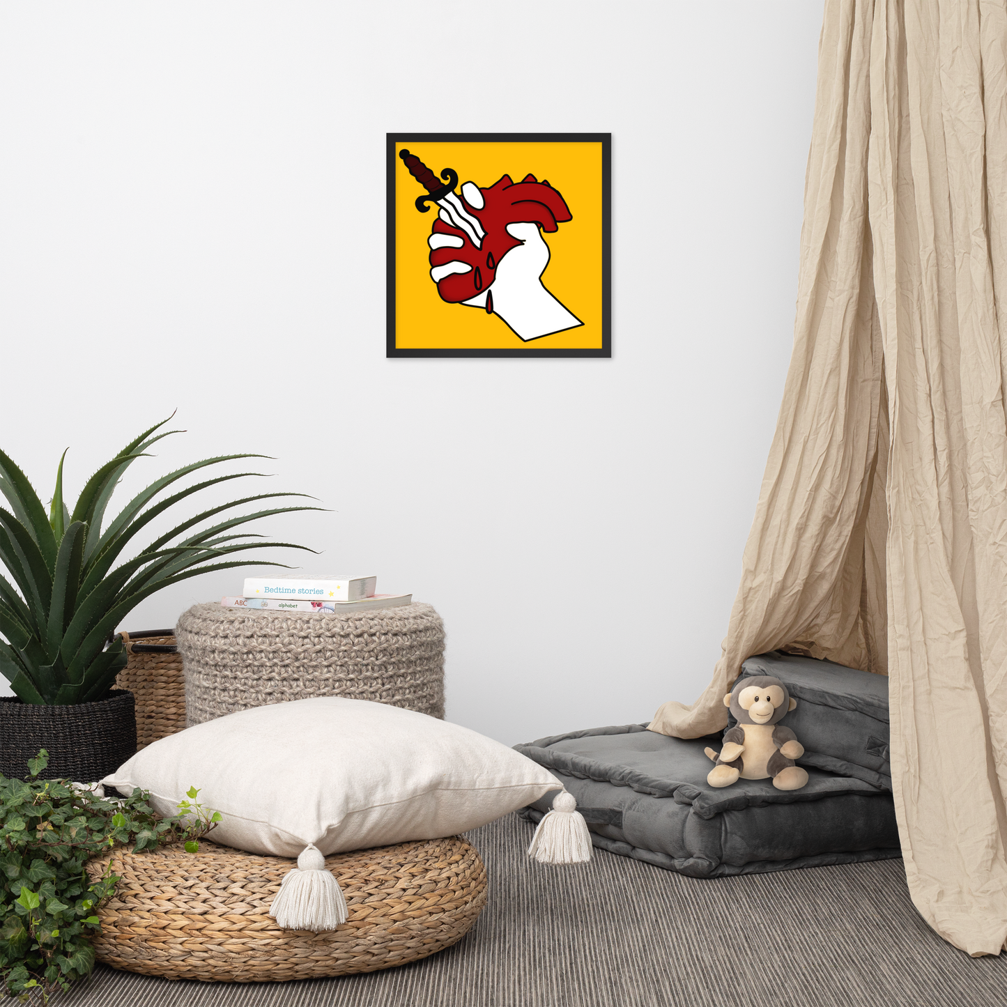 Room interior with a colorful abstract painting on the wall, plants, and a pouf with a pillow.