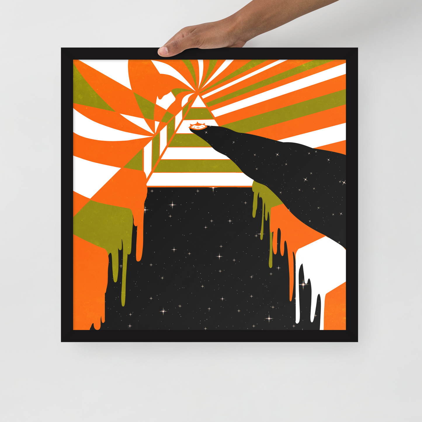 Framed abstract artwork with orange, green, and black colors on a white background