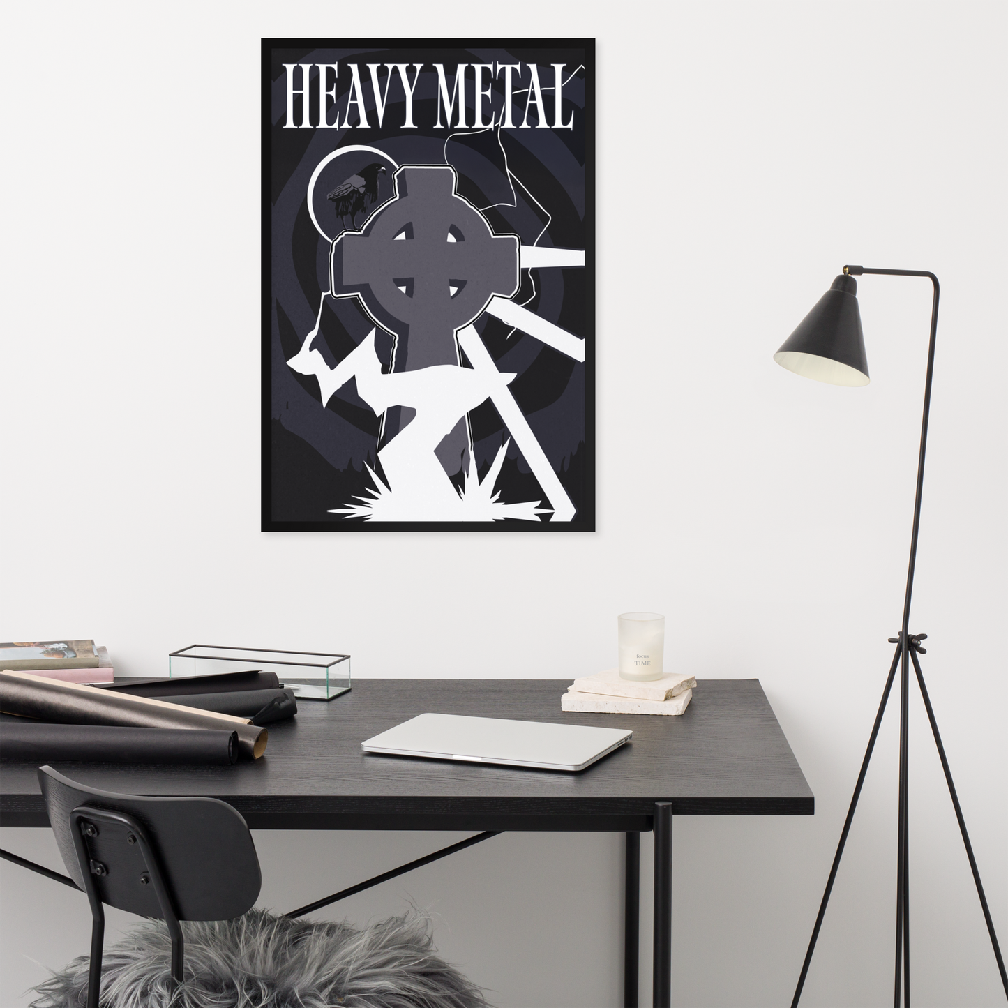 Poster with 'Heavy Metal' design on a wall above a desk.