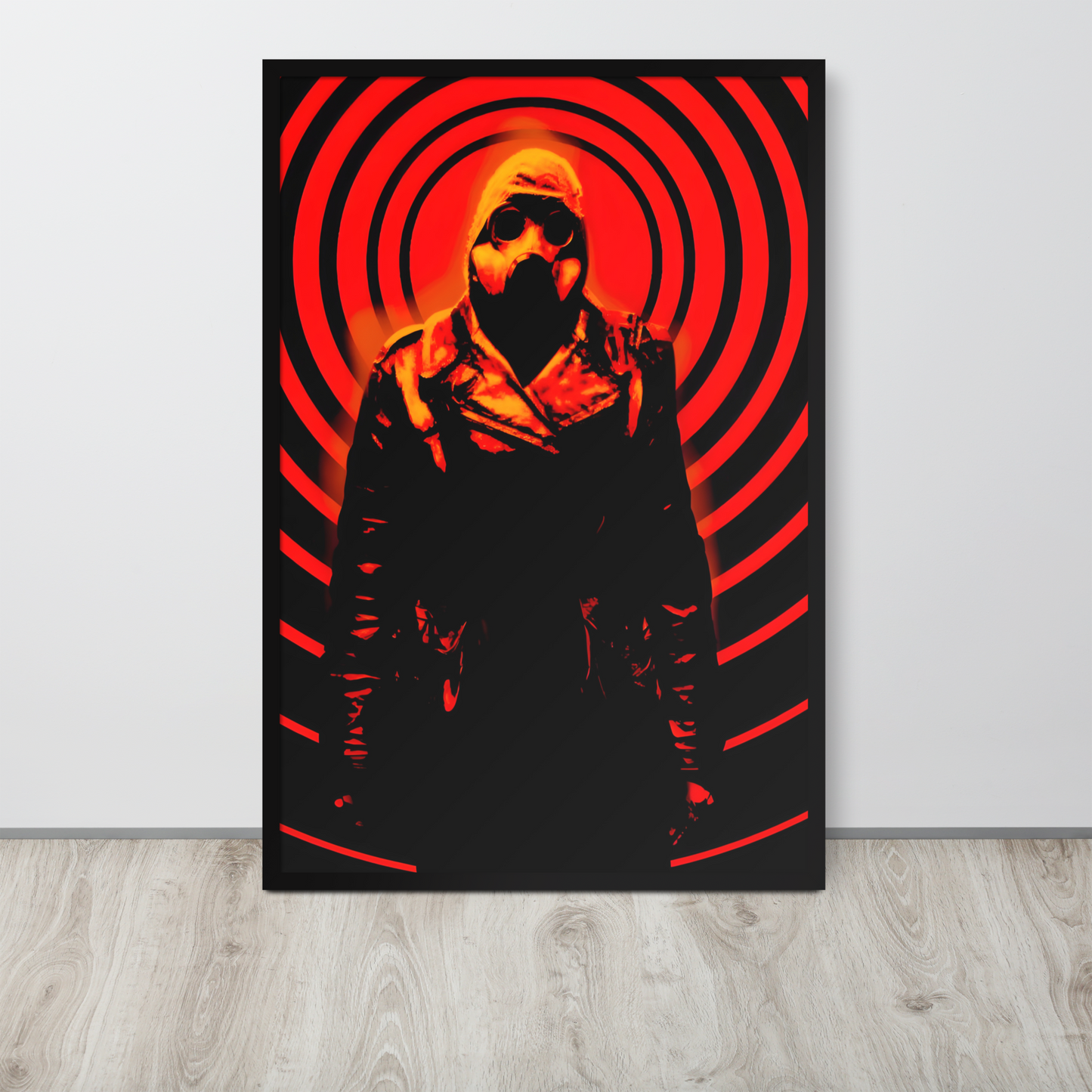 24x36 large framed artwork of a mysterious figure in a dark outfit with a hood and a gas mask against an orange and black circular background on a white wall.