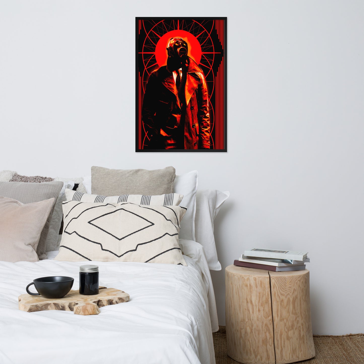 Bedroom with a bed, pillows, and a nightstand with a framed 24x36 stylized, art-deco style illustration in orange, black, and white tones, with a mysterious figure in a gas mask and a trench coat in the center on the wall.