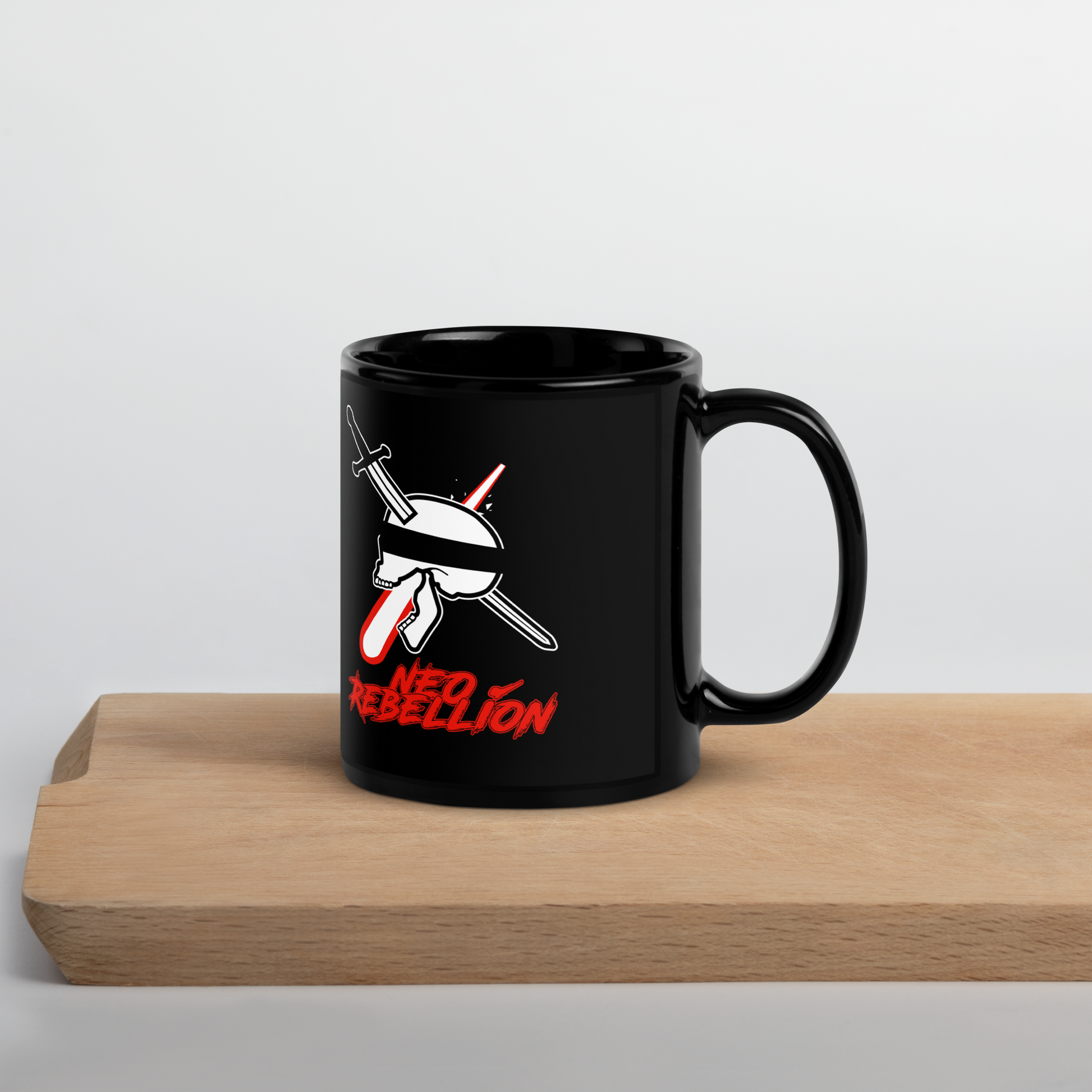 Black mug with a graphic design on a wooden surface