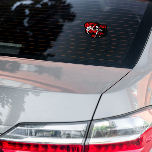 Car sticker with skeleton design on a car's rear window