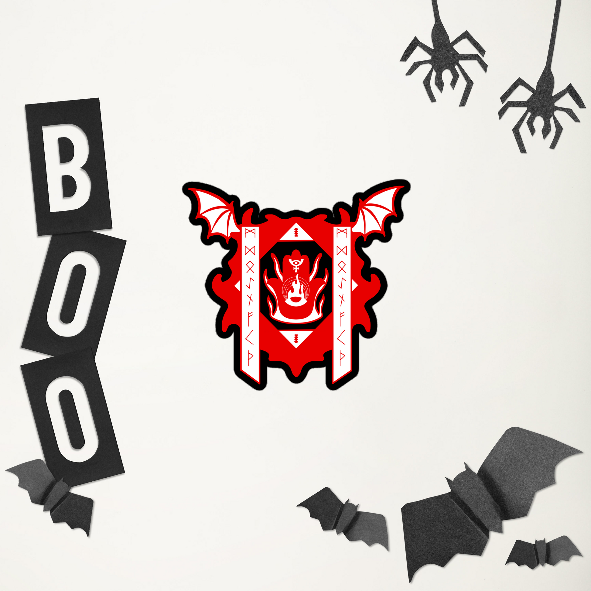 Halloween-themed decorations including a red and black emblem, 'BOO' letters, bats, and spiders on a white background.