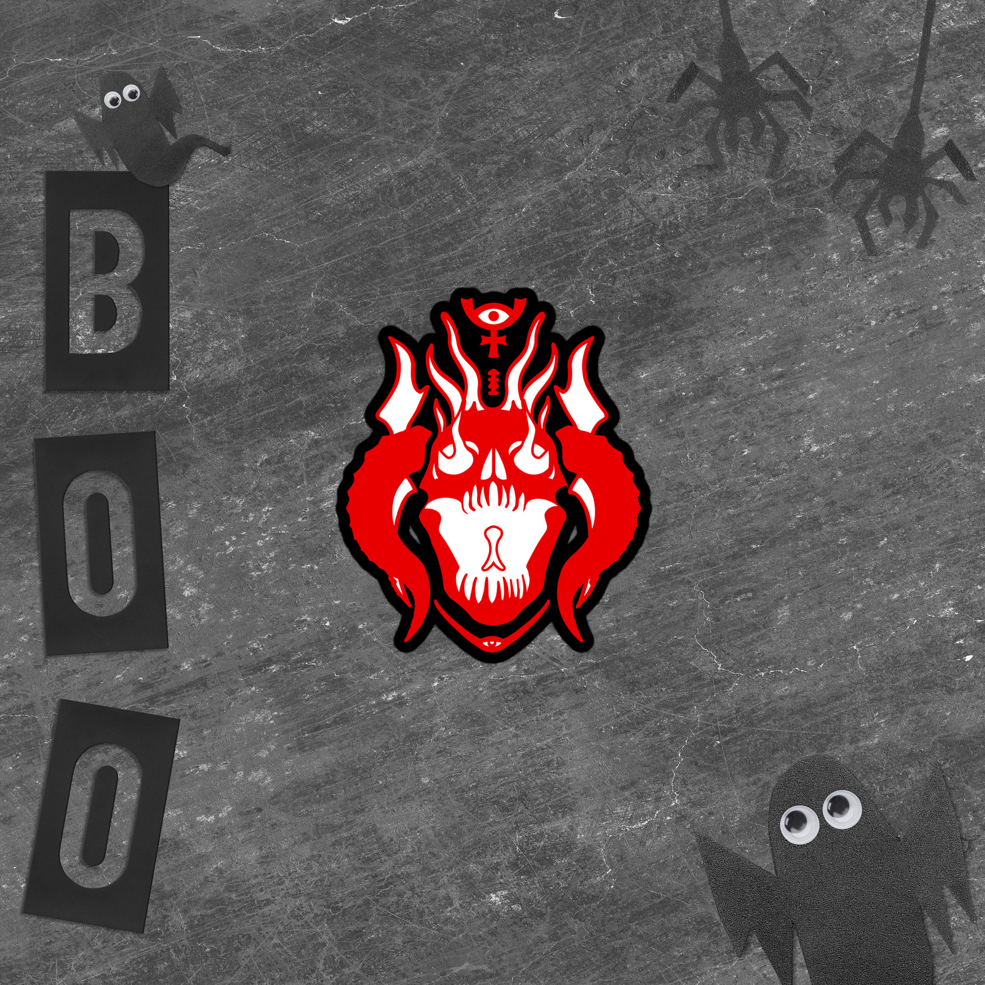Red demon skull design with flames on a gray background with 'BOO' letters and ghost silhouettes.