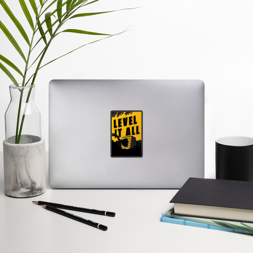 Laptop with a 'Level It All' sticker on a desk with a plant, pencils, and books.