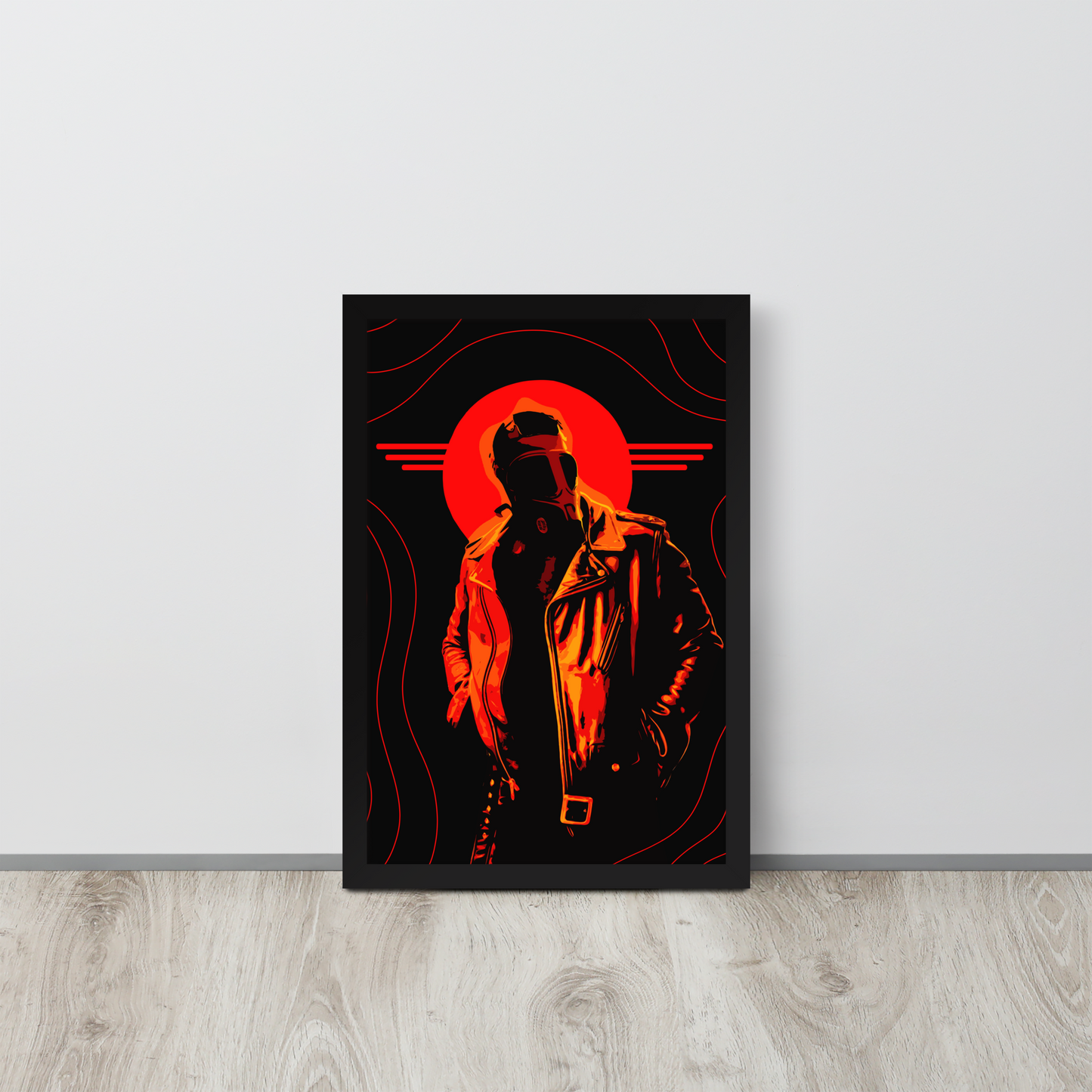 Framed artwork of a person in a leather jacket with a red circle on a black background, leaning against a light gray wall.