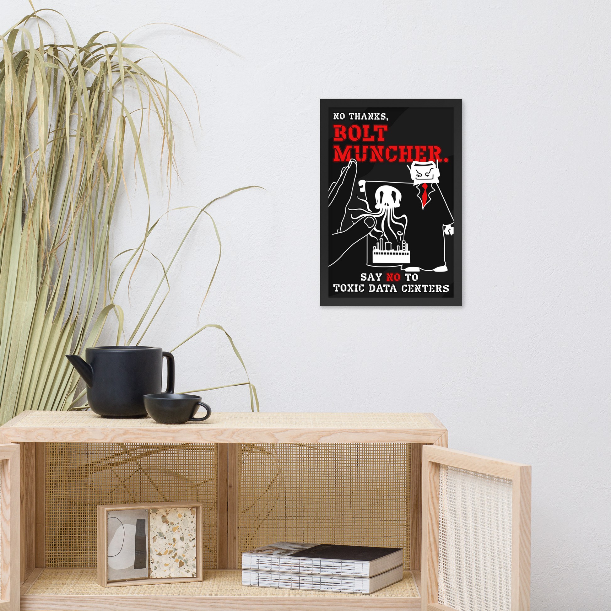 A framed poster with a black background and red text reading 'BOY THANKS. BOLT MUNCHER.