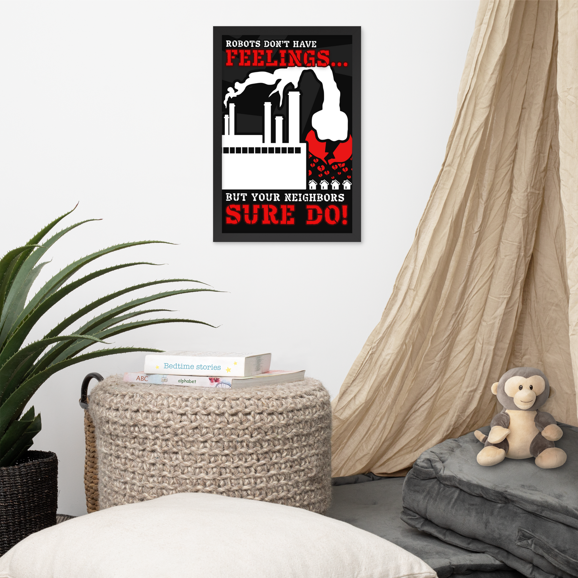 A framed wall poster with a black background, red and white text reading 'ROBOTS DON'T HAVE FEELINGS.