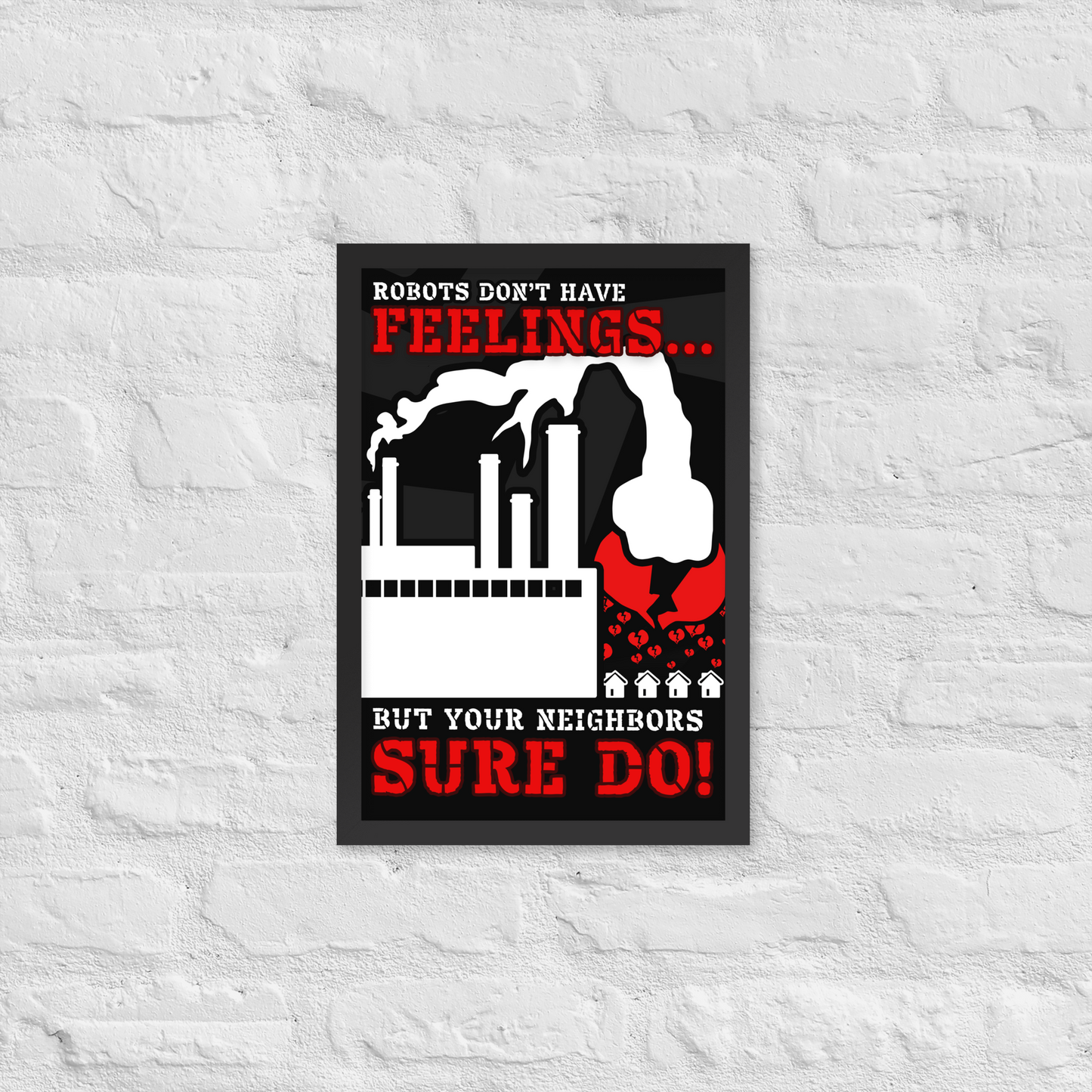 A framed black-and-red humorous poster with white text reading 'ROBOTS DON'T HAVE FEELINGS.