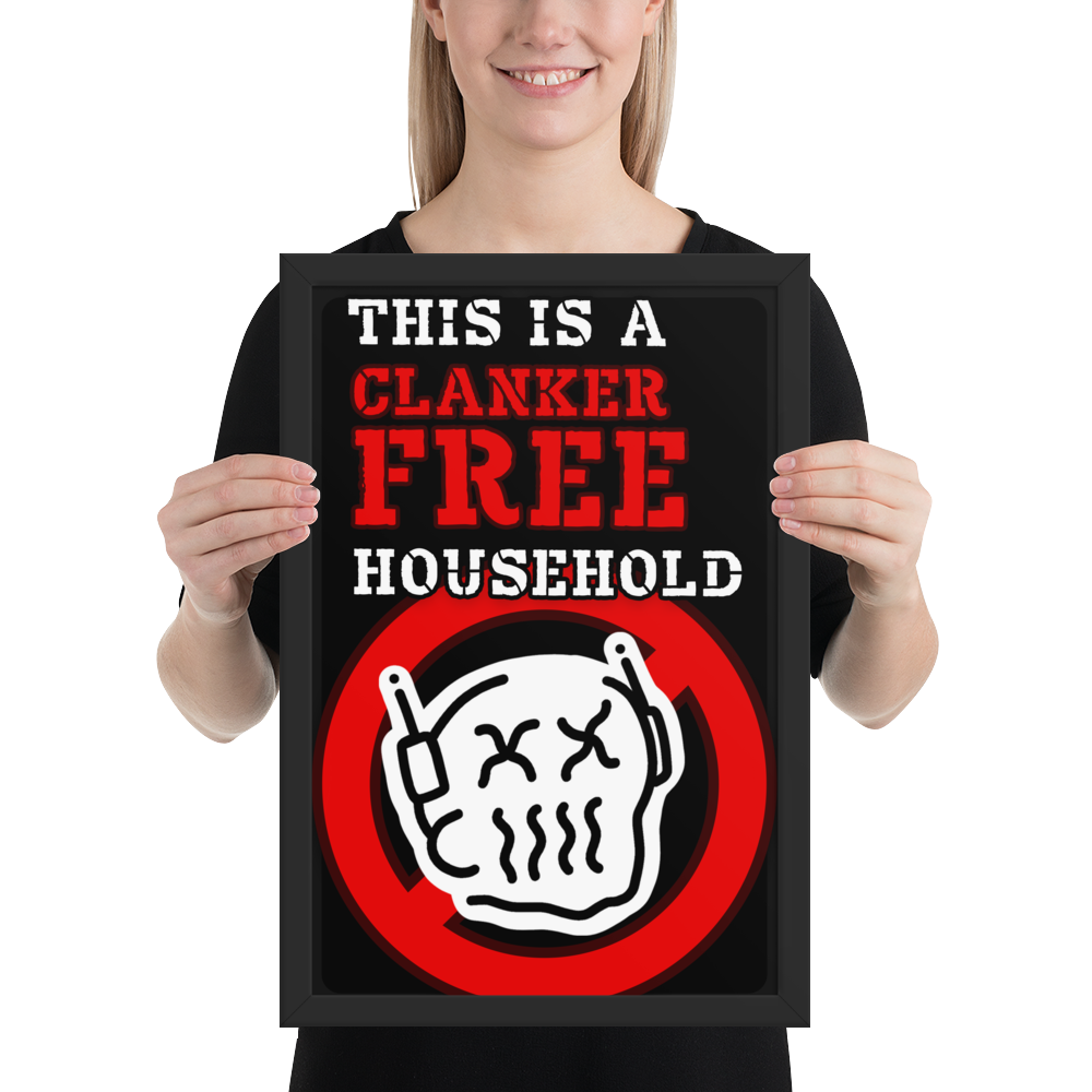 A woman holding a black poster with the text 'THIS IS A CLANKER FREE HOUSEHOLD' in white and red, featuring a cartoon skull inside a red prohibition symbol.