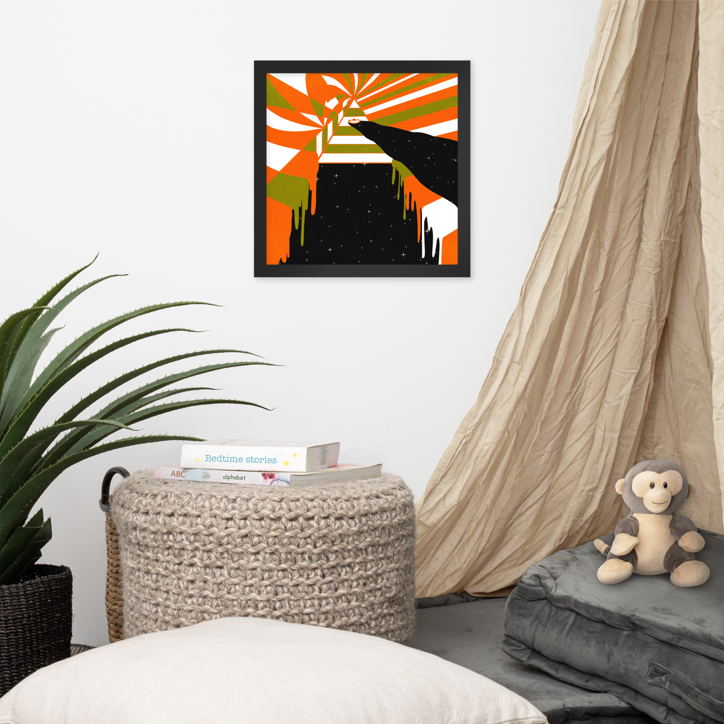 Room interior with abstract art, plant, and plush monkey toy.