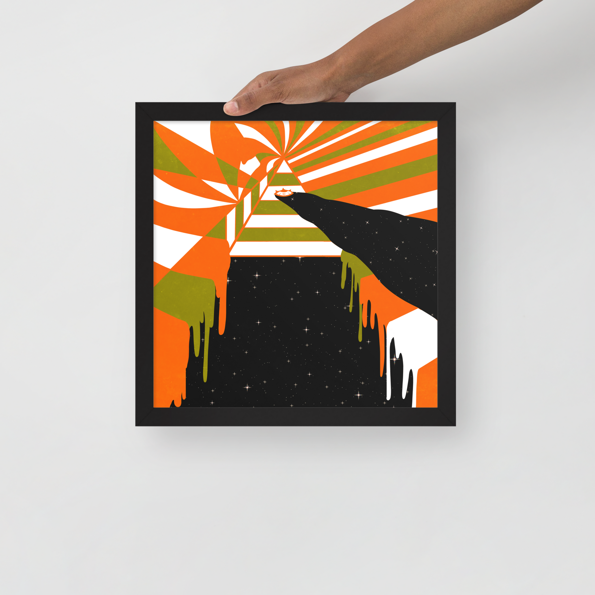 Framed abstract artwork with orange, green, and black colors on a white background