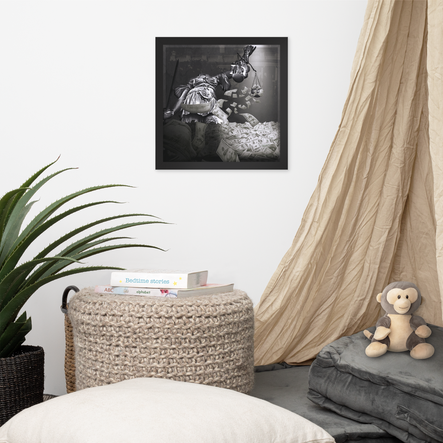 Living room with a framed black and white photo, plant, ottoman, and monkey plush toy.