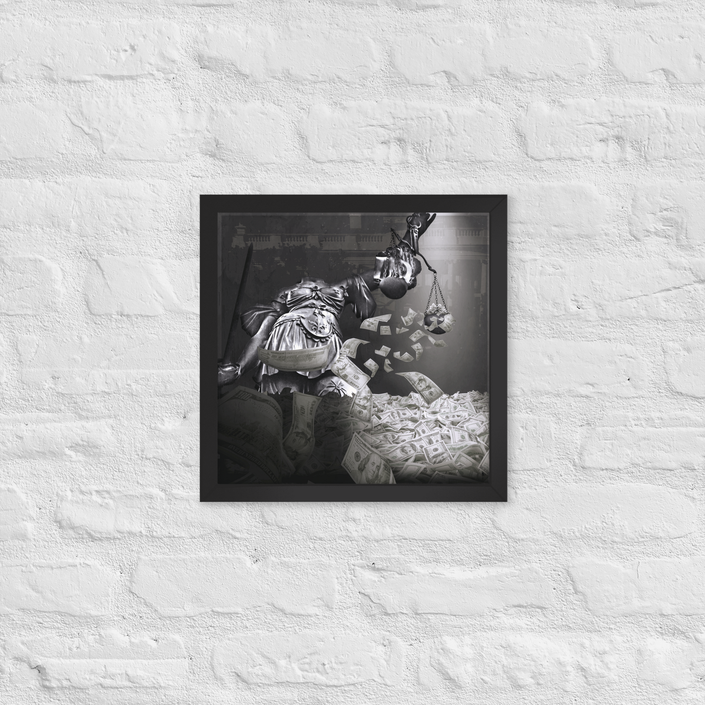Framed black and white artwork on a textured white wall