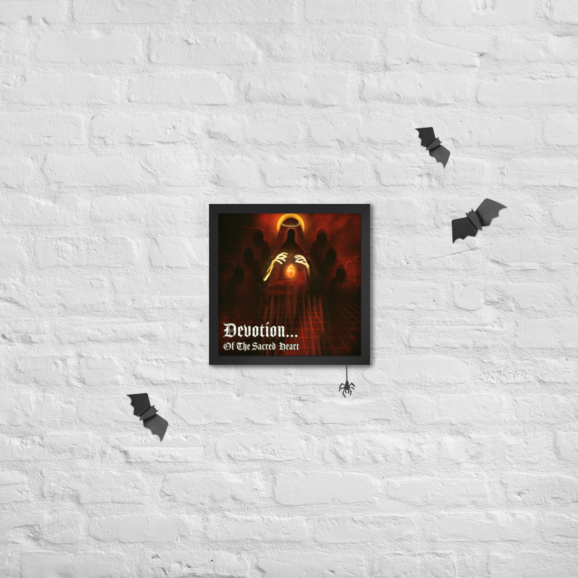 Framed artwork with a dark theme and text on a white brick wall.