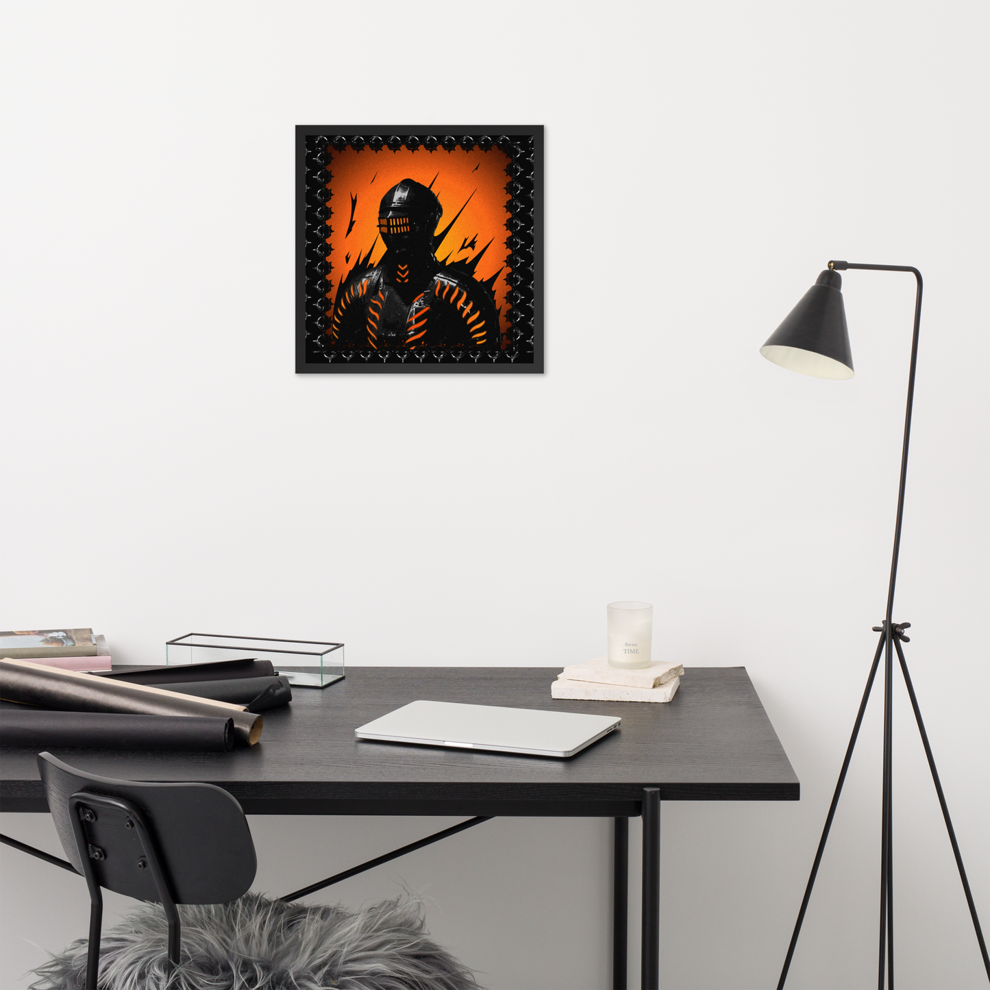 Modern office setup with a framed artwork on the wall, desk, chair, and lamp.