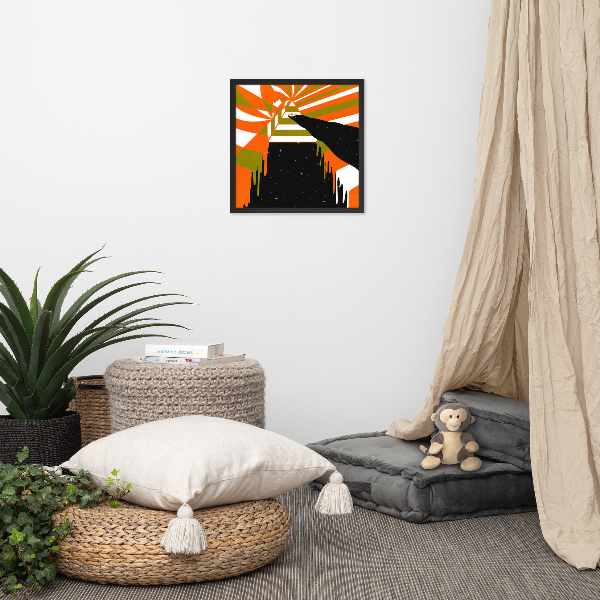Room interior with a colorful abstract painting on the wall, plants, and a pouf with a pillow.