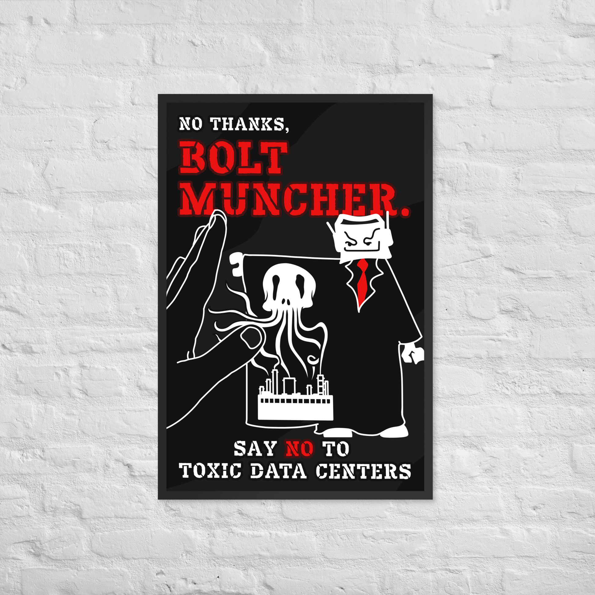 A framed black poster with bold red and white text reading 'NO THANKS, BOLT MUNCHER.' and 'SAY NO TO TOXIC DATA CENTERS,' featuring a stylized figure and tentacle graphic, displayed against a white brick wall.