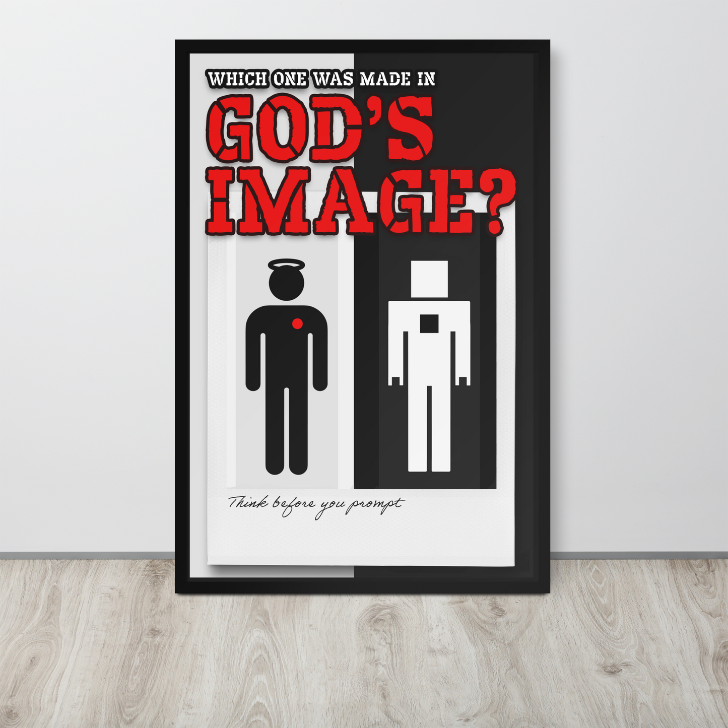 A framed poster leaning against a light gray wall on a pale wood floor. The poster has a black border and features the text 'WHICH ONE WAS MADE IN GOD'S IMAGE?' with red lettering, a black human figure with a red heart on a light gray background, and a white robot-like figure on a black background.