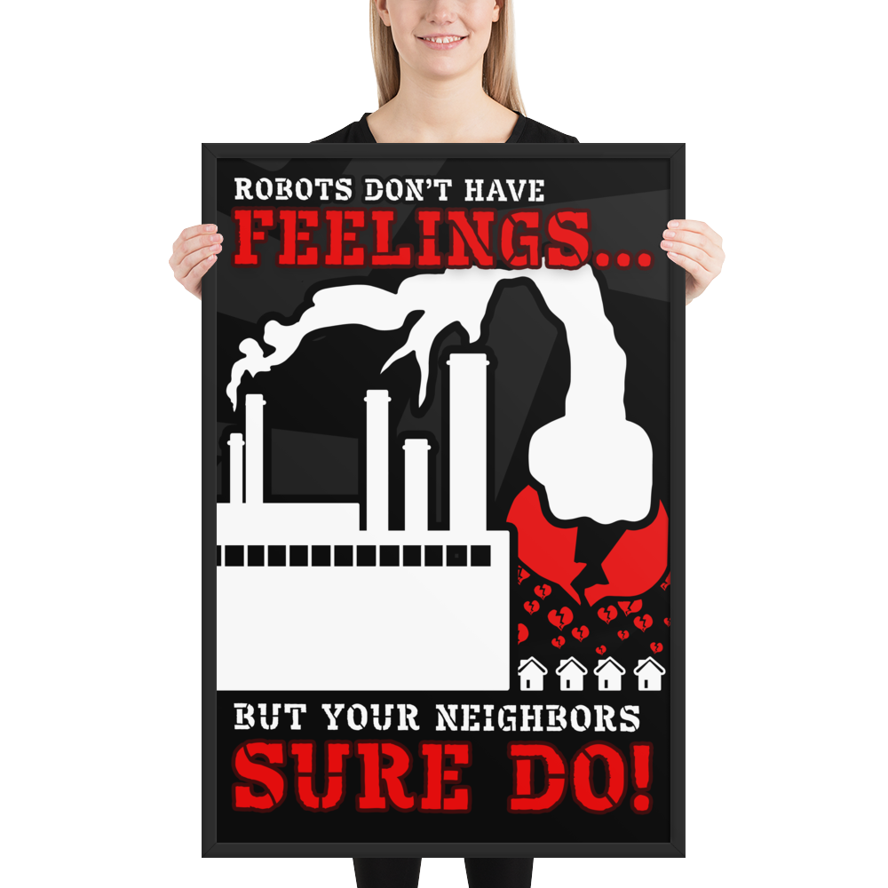 A woman holding a framed black-and-white warning-style poster with bold red text reading 'ROBOTS DON'T HAVE FEELINGS.