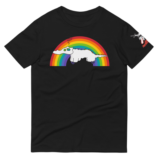 A black short-sleeve crewneck t-shirt featuring a graphic of a die-cut sticker featuring a white cartoon creature with a long tail, set against a large rainbow arch on a plain white background. A small red and white logo is printed on the left sleeve.